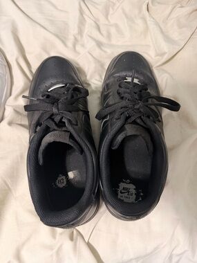 Nike All-Black Leather Low-Top Sneakers